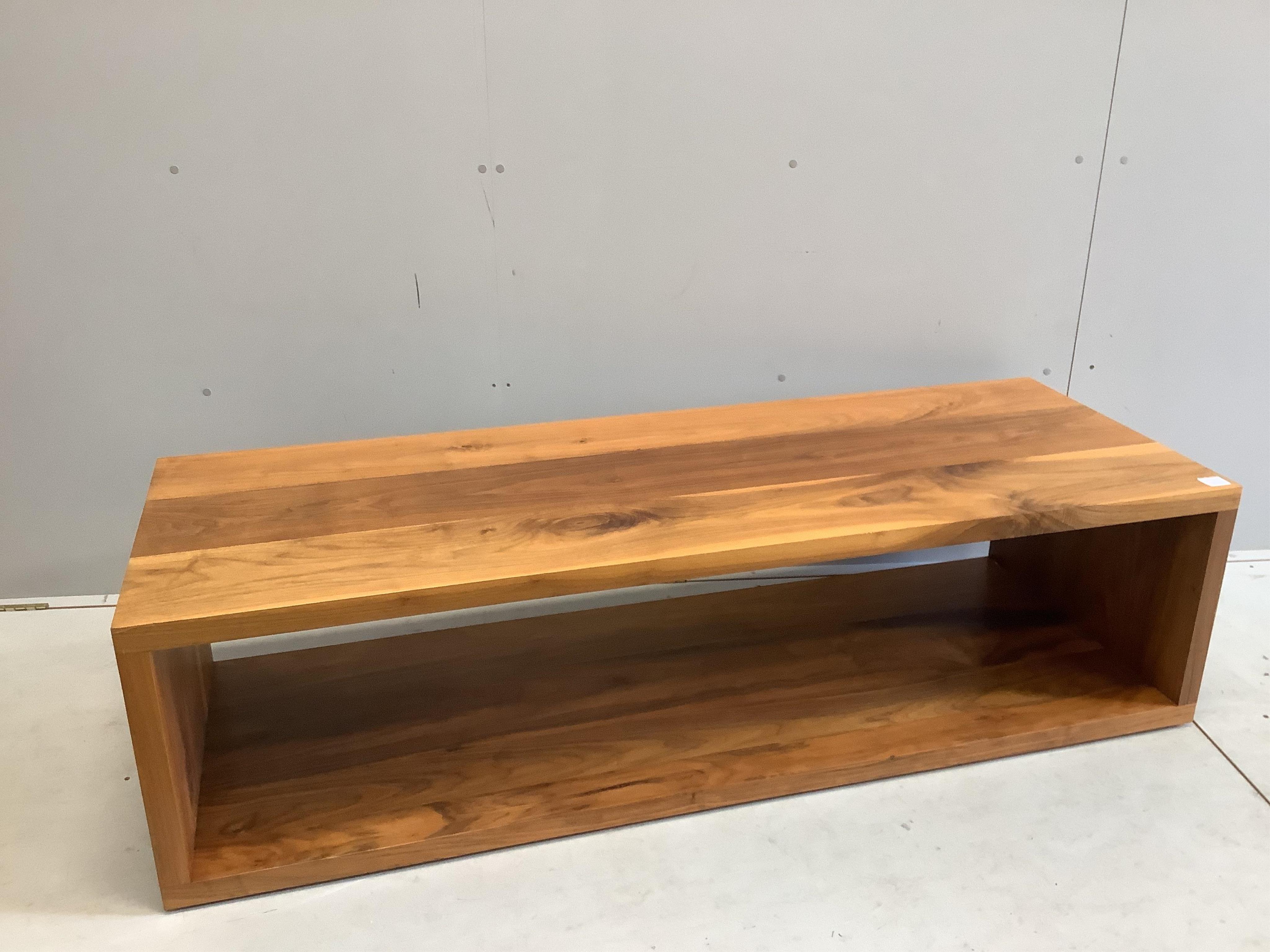 A Contemporary black walnut coffee table / media stand, width 170cm, depth 60cm, height 46cm